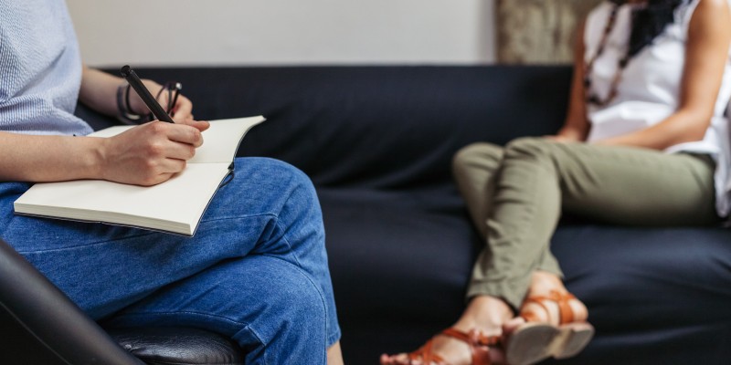 Psychotherapy session, woman talking to his psychologist