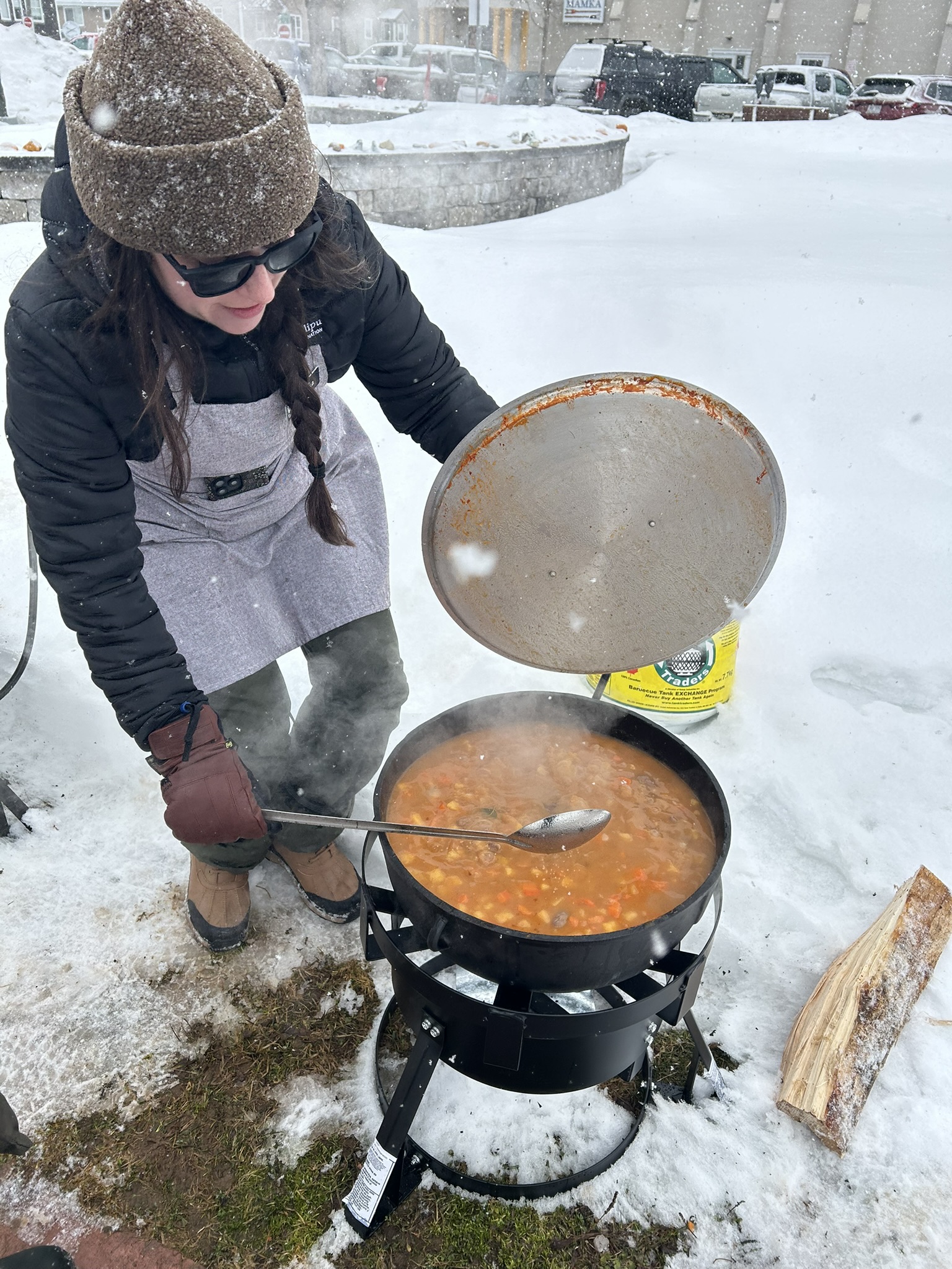 Denika, Manager of Environment and Natural Resources cooks a great pot of Moose Soup