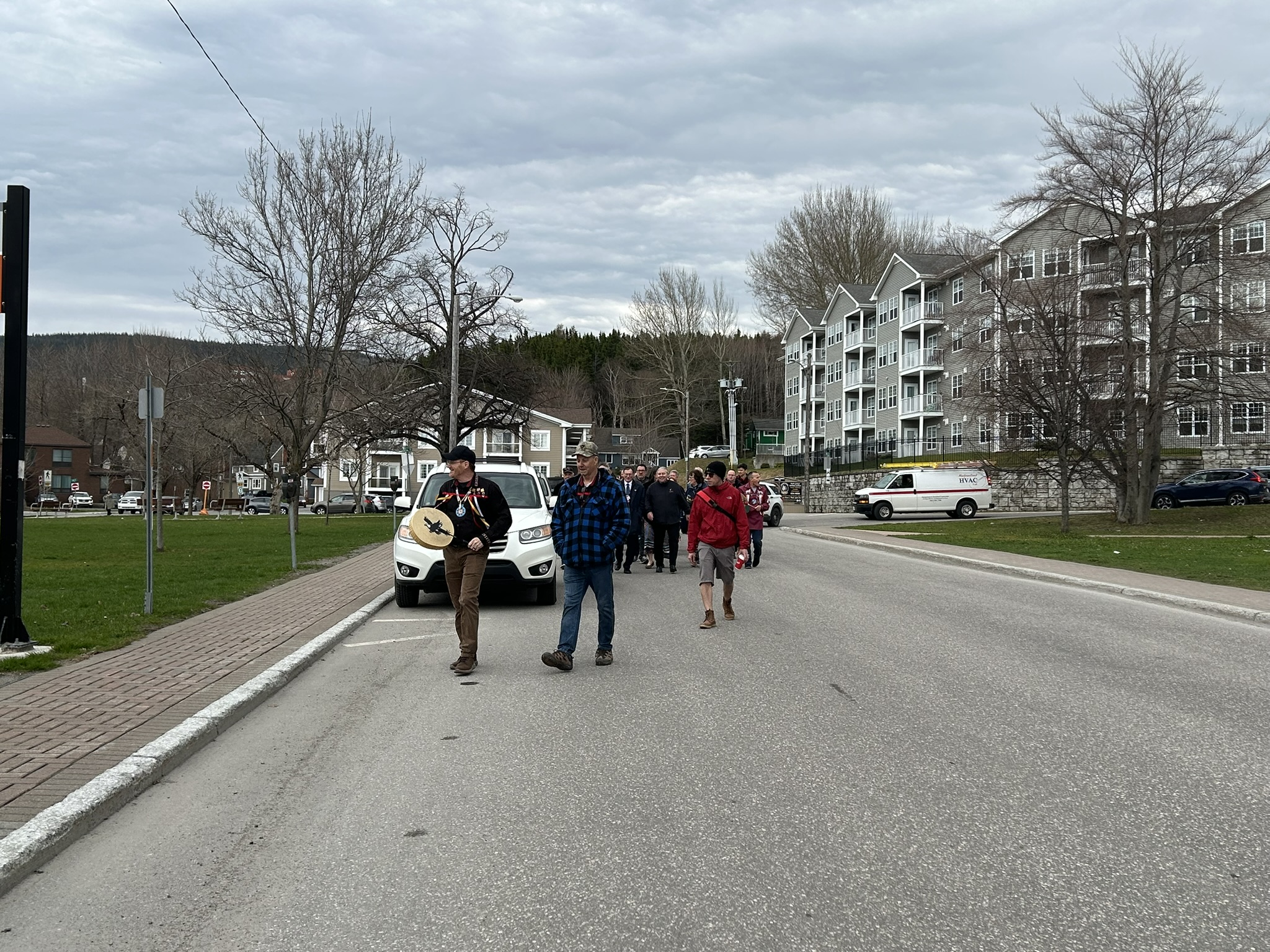 - Participants walked down West and Parks streets to show support in ending violence against women and children.
