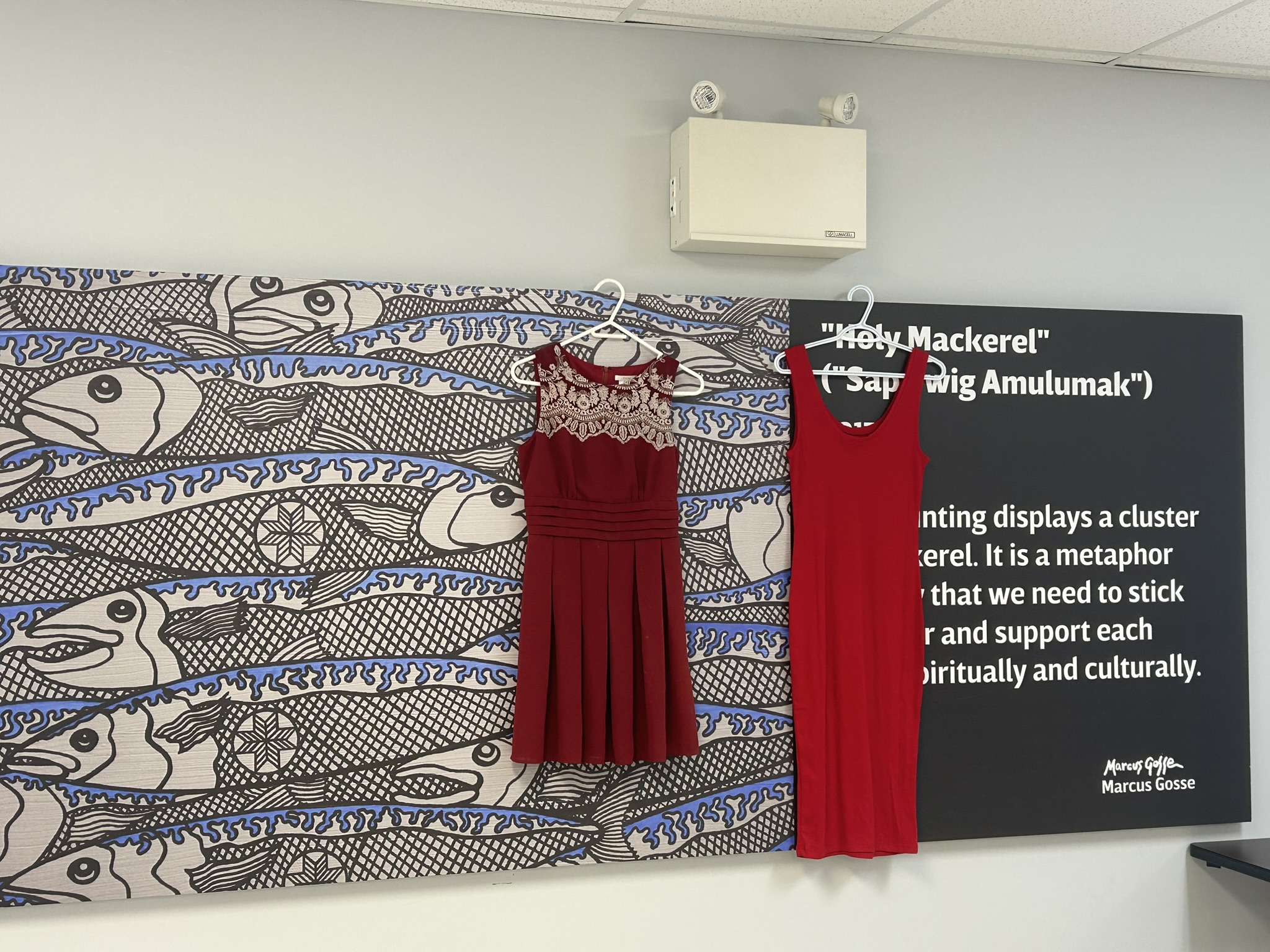Red dresses hung in the community room during the event on Monday, May 5 in honour and remembrance.