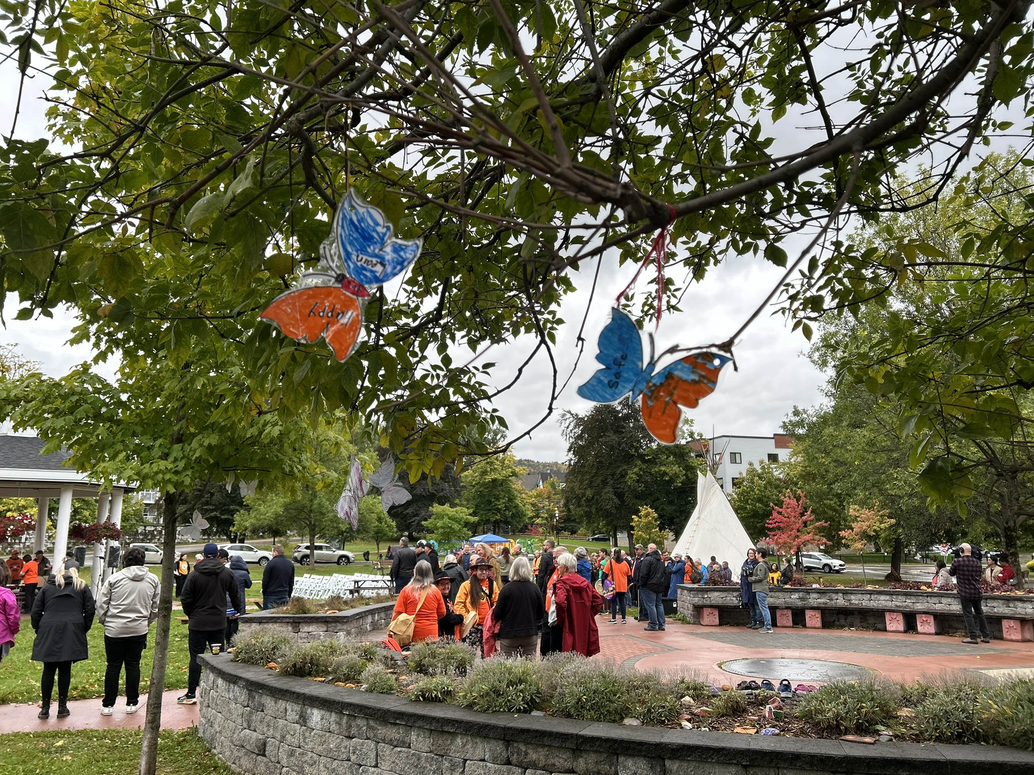 Children colored butterflies that were placed around the Majestic Lawn, representing their hopes for the future of all children. They recognize the sadness caused by residential schools and the impact on families. 
